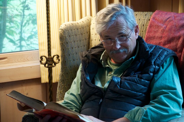Bob enjoying a quiet moment reading about Fairhope's history.