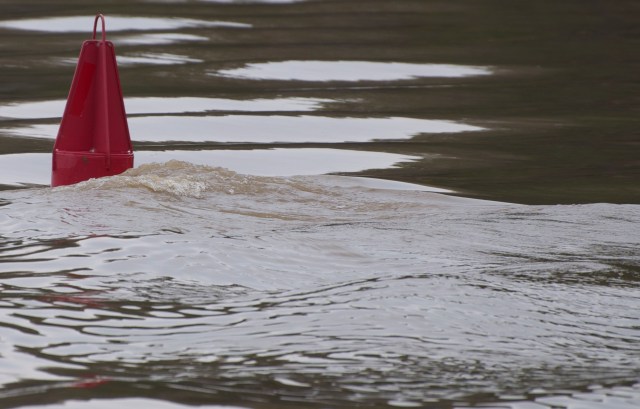A red nun marking the LDB is pulled by the strong current.