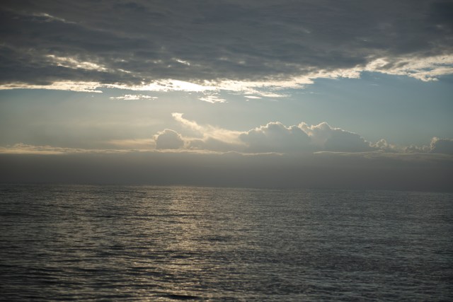 Note the calm seas; the morning's silver lining to our crossing.