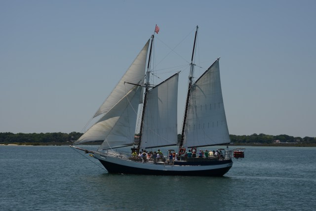 A schooner whispers across the sound at St. Augustine.