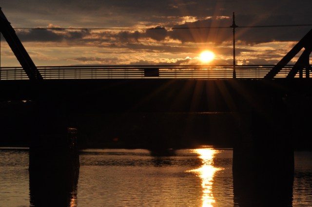 Colors change as the sun sets over the bridge to Peebles Island.