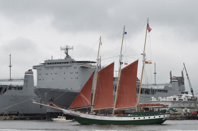 This gaff-rigged schooner brought color to an otherwise very gray day.