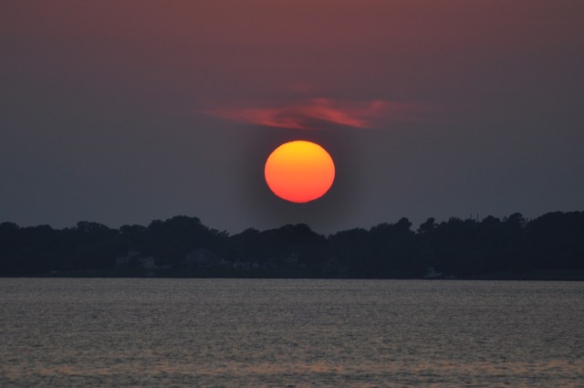 Being rewarded with a stellar sunset in a peaceful anchorage.