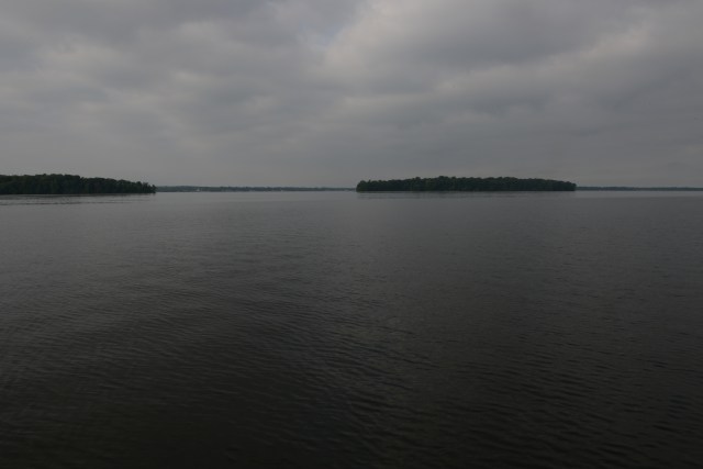 Frenchman and Dunham Islands on a calm Lake Oneida.