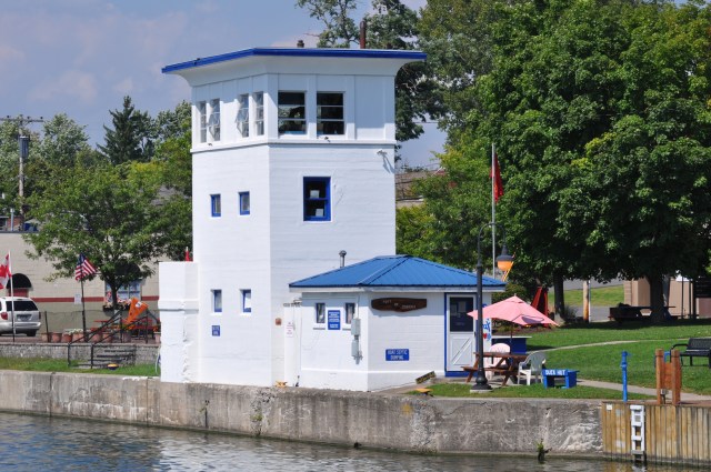An old lock house at  adorns the shore.