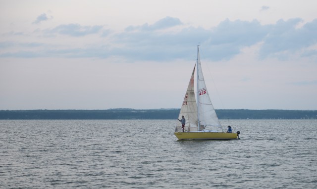 Sailboats cruising by are an added attraction on the lake.