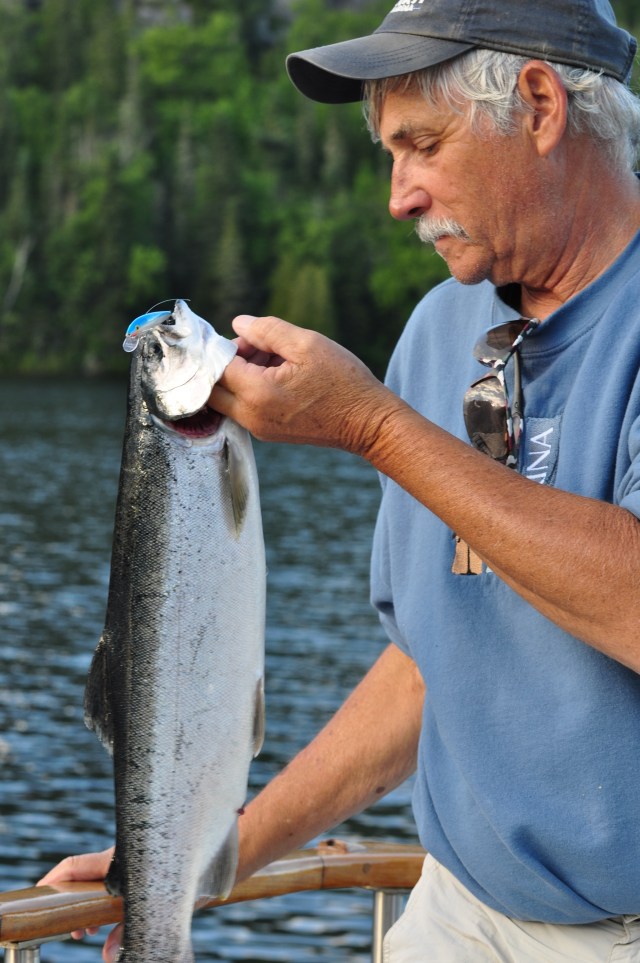 Bob with the fish that we caught - through copious amounts of teamwork!