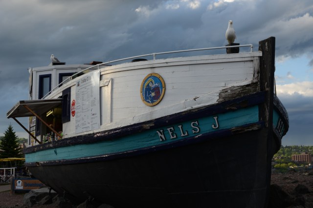 A 1930s-era boat being reutilized as an outdoor concession stand.
